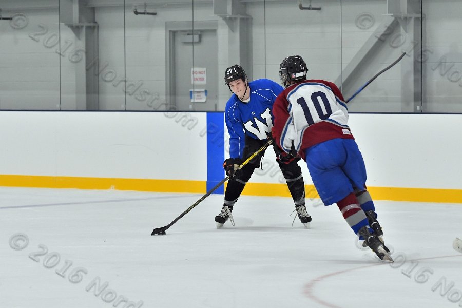 Wheaton College Men\'s Ice Hockey vs Middlesex Community College. - Photo By: KEITH NORDSTROM